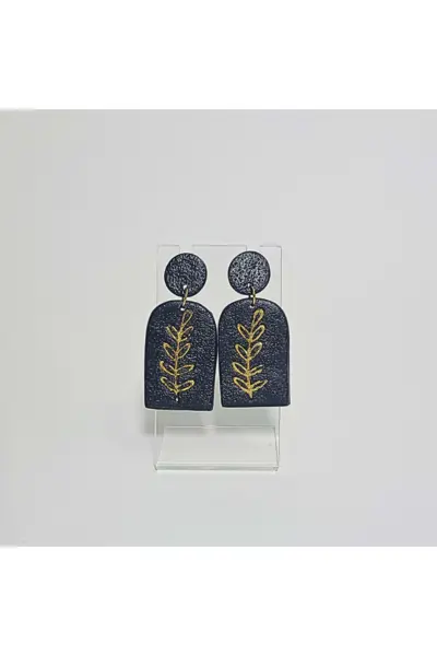 Negro con Hojas Doradas