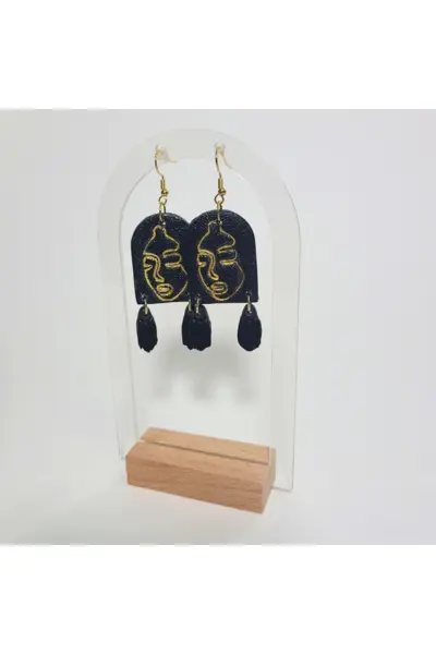 Negro y Rostros Dorados