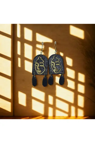 Negro y Rostros Dorados